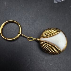 Avon 1984 Retractable Key ID Holder Gold Tone Pearlescent VIntage